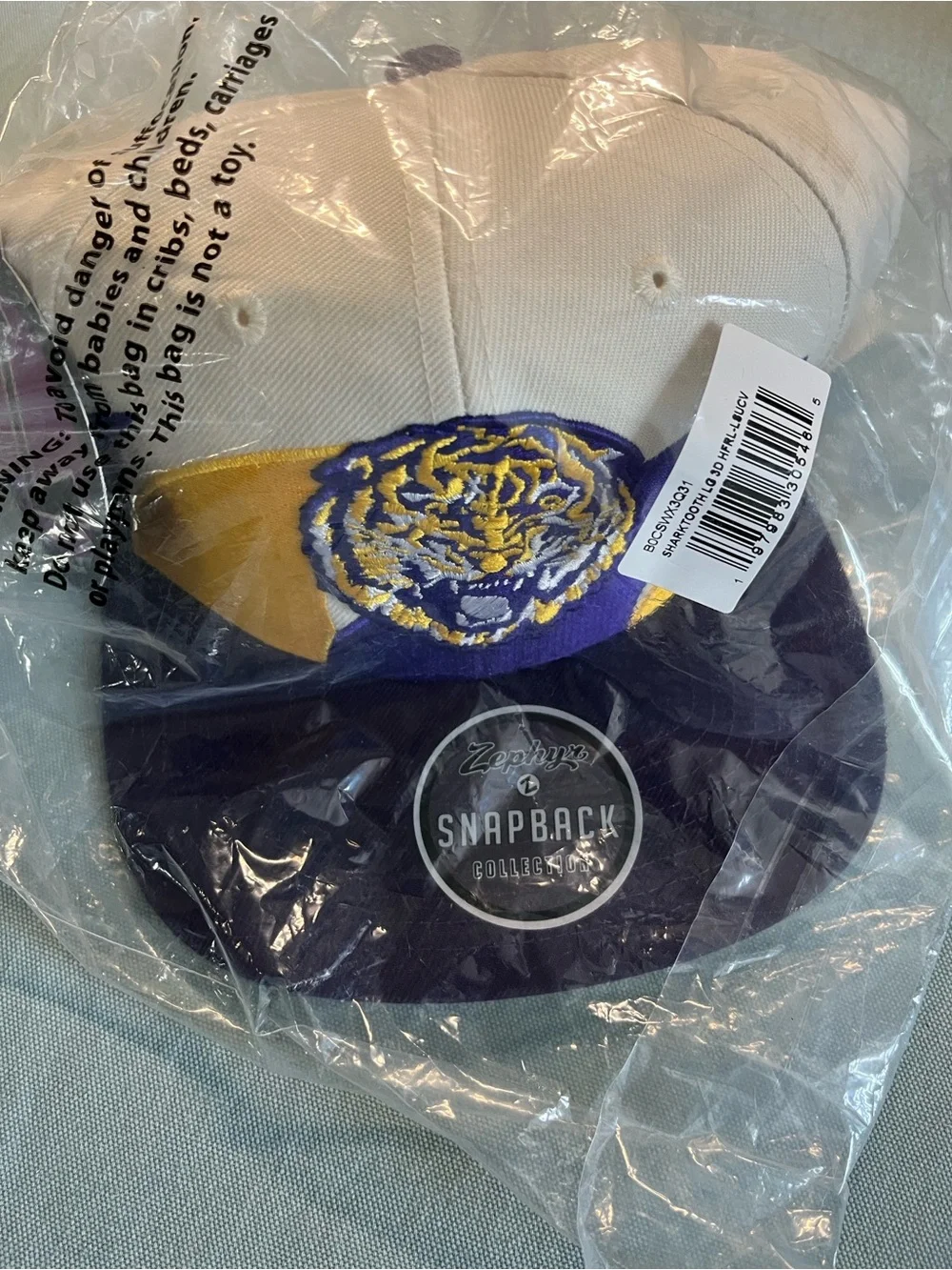 Zephyr Cream Snapback Hat with Purple & Gold Tiger Patch